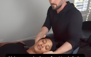 Chiropractor in Los Angeles adjusting a patient having neck pain