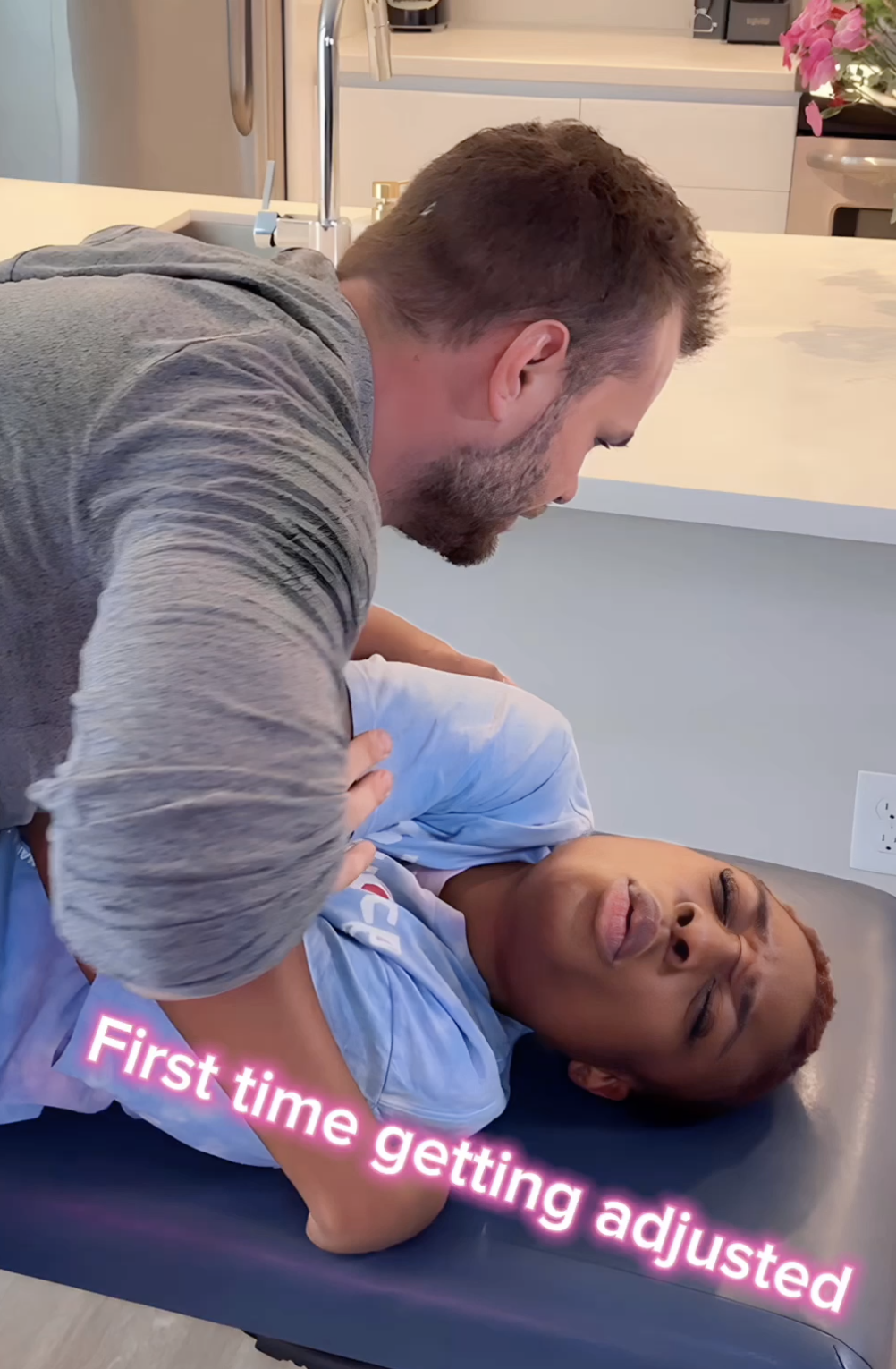 Chiropractor in Los Angeles performing an adjustment on first time patient with Testimonals