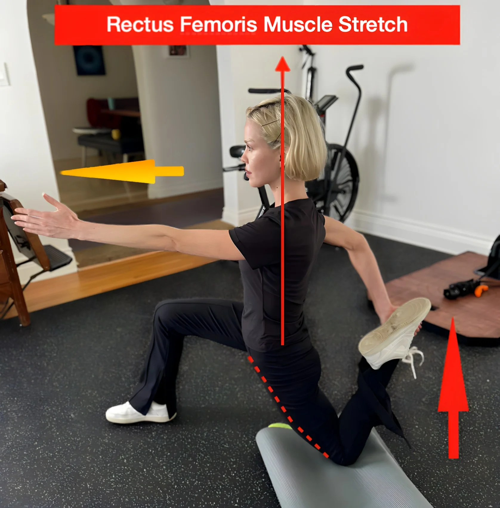 a picture of a women performing a stretch for the rectus femoris muscle