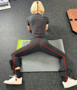 Body position and techniques descriptive picture of how to isolate and stretch the Middle fibers of the Adductor Magnus